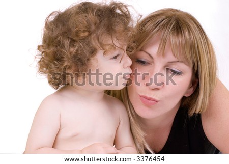 girl kissing her mom, white isolated