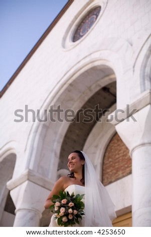 bride in front of the church