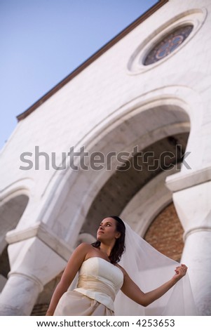 bride in front of the church