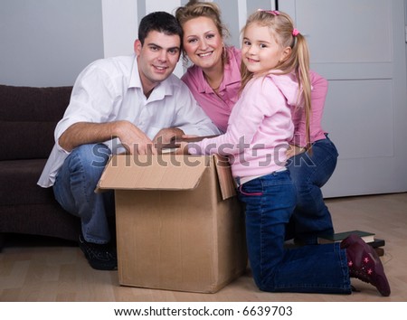 young family moving house, real estate concept