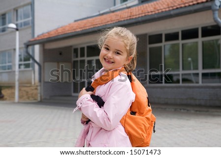 first grade student going to school