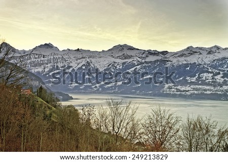 Swiss Alps mountains and lake view near Thun lake in winter