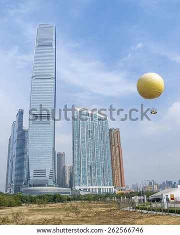 International commerce center tower and balloon in Hong Kong Kowloon skyline view