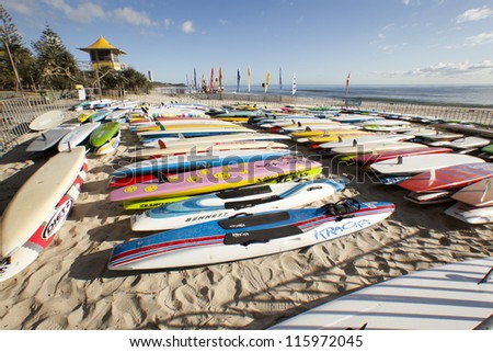 GOLD COAST,  AUSTRALIA  - SEPT 14 2012 : Unidentified  surf boards on the beach   in the Colangatta Gold life saver  competition  on Sept, 14, 2012 in Gold Coast Australia, .