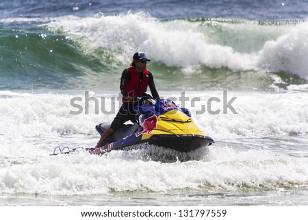 SNAPPER ROCKS, GOLD COAST, AUSTRALIA - 9 MARCH: Unidentified support team rides a sea doo to help in the Quiksilver & Roxy Pro World Title Event. 9 March 2013, Snapper Rocks, Gold Coast, Australia