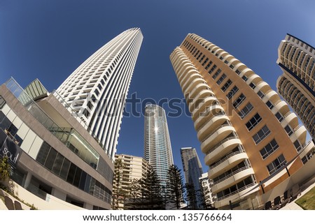 OLD COAST - JANUARY 26: Ultramodern buildings facade. Contemporary ultramodern architecture is the new trend in Queensland Gold Cost. Gold Coast Broad Beach 26 January 2013 Australia.