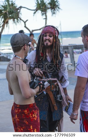 GOLD COAST - FEB 19: An unidentified man poses as Jack Sparrow from Pirates of the Caribbean movie franchise at an informal  Weekend Market Feb.19, 2012 in Gold Coast Australia.