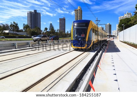 GOLD COAST AUSTRALIA - MARCH 29: Brand new light rail on test run (not yet open for the public), under commissioning at Surfers Paradise on March 29, 2014 Australia