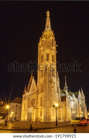 BUDAPEST MAY 8 2014: Newly renovated Mathias Church in Budapest is a big attraction for tourists all over the world. Budapest\'s beauty shown at night through many centuries of architecture, Hungary.