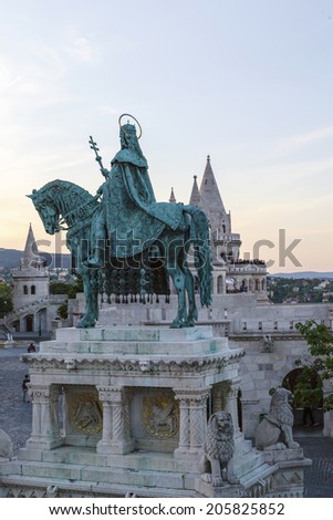 BUDAPEST MAY 11 2014: View of St. Stephen Statue and Matthias Church at Fishermen\'s Bastion, is one of the most-visited attractions in Budapest, on 11 May 2014  Hungary.