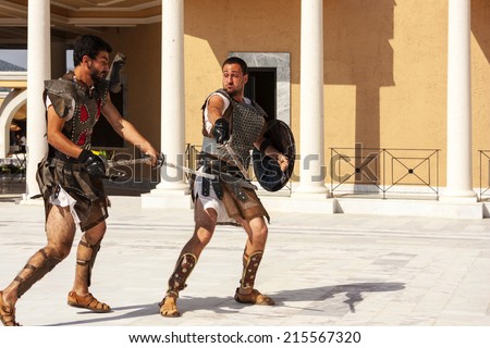 ROME, ITALY, MAY 26 2014: Birth of Rome festival - performing fight  of gladiators and all other ancient ceremony, the parade of 2,000 actors from 11 European countries.,  Rome on May 26, 2014