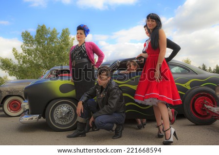 THORNCLIFF CALGARY CANADA, SEPT 13 2014: The annual Show and Shine with Pin Up Girls  \