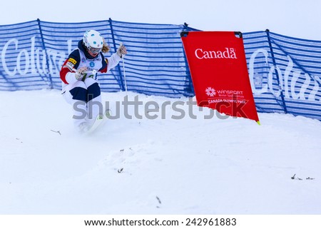 CALGARY CANADA JAN  3  2015.  FIS Freestyle Ski World Cup, Winsport, Calgary Ms. All Kariotis from USA  at the Mogul Free Style World Cup on race day.
