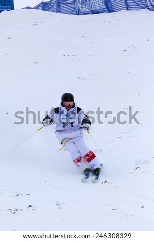 CALGARY CANADA JAN 3 2015. FIS Freestyle Ski World Cup, Winsport, Calgary Mr. Unidentified F1 fort Runner  from Canada  at the Mogul Free Style World Cup on race day.