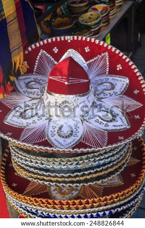 Colorful Mexican sombrero souvenirs for sale in Yucatan, Riviera Maya, Latin America. Mexico travel background.