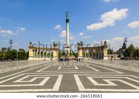 BUDAPEST -  MAY 12  2014: Tourists visit Millennium Monument in Heroes Square  in Budapest,  Hungary. This square has been UNESCO World Heritage site since 2002.