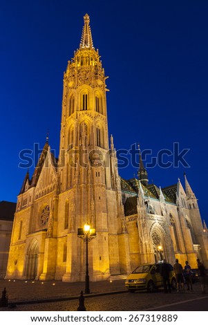 BUDAPEST MAY 9 2014: Newly renovated Mathias Church in Budapest is a big attraction for tourists all over the world. Budapest\'s beauty shown at night through many centuries of architecture, Hungary.
