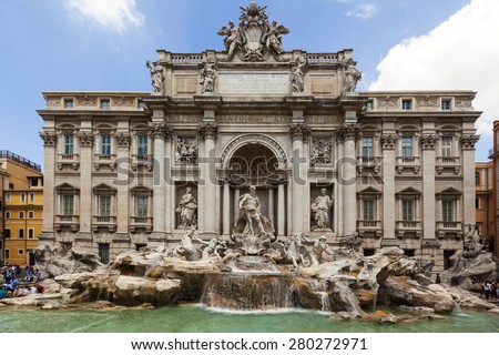 ROME, ITALY - MAY 21, 2014: Tourists visiting the Trevi Fountain. Trevi Fountain is an iconic symbol of Imperial Rome. It is one of Rome\'s most popular tourist attractions.
