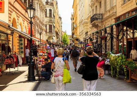 BUDAPEST APRL 29 2014: The newly renovated inner city in Budapest is a big attraction for tourists all over the world. Budapest\'s beauty shown through many centuries of architecture, Hungary.