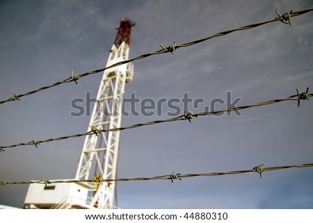 barbed wire and oil drilling