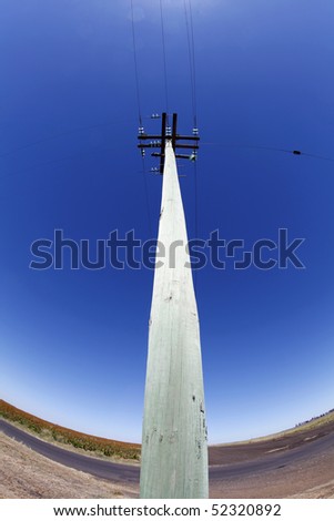 electricity pole in rural field