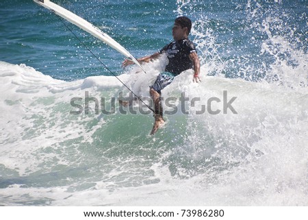 gold coast australia surfing. GOLD COAST, AUSTRALIA - 25