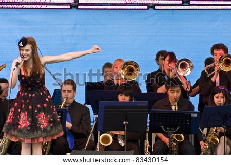 BROADBECH, AUSTRALIA - AUGUSTUS 20      UQ Big Band\'s Female singer performs at the jazz festival  on  August 20 2011 Broadbeach Gold Coast Australia