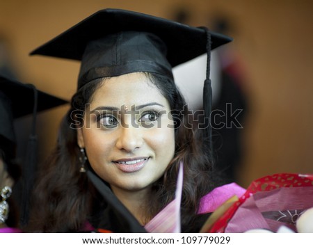 Happy Asian Indian female student in her graduation day