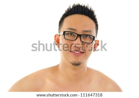 Pan Asian male portrait on plain background