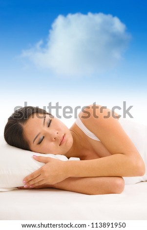 Young Asian girl sleeping on a pillow with white cloud over her top