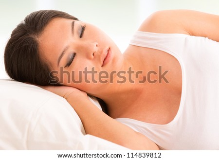 Asian female having a good sleep at home