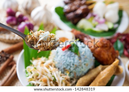 Nasi kerabu, famous Malaysian Malay rice dish. Traditional east coast blue rice. Popular in states such as Terengganu or Kelantan . Malaysia food, Asian cuisine.