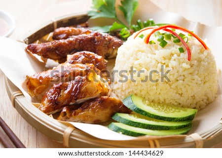 Malaysia grilled chicken rice. Asian style Hainan chicken rice close-up. Asian food.