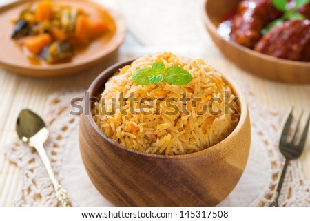 Indian meal biryani rice or briyani rice and curry, fresh cooked, indian dish.