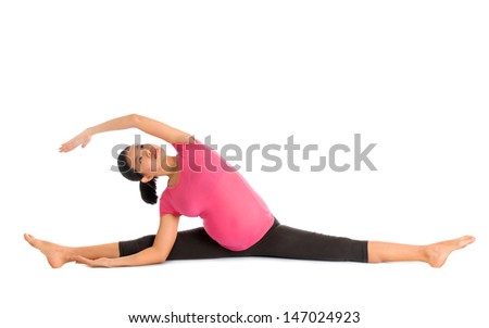 Prenatal yoga. Full length Asian pregnant woman doing gymnastic stretching, full body isolated on white background.