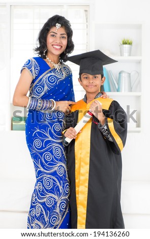 Kindergarten graduation. Asian Indian family, mother and son on kinder graduate day.