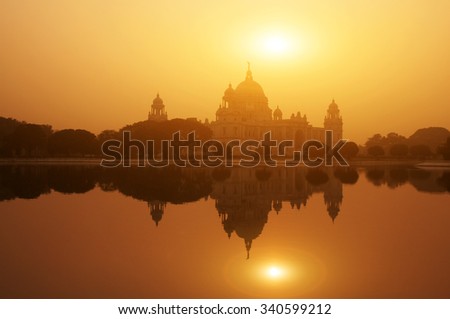 Sunset lake reflection Victoria Memorial in Kolkata or Calcutta, India.