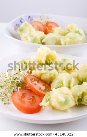 Potato salad. Fresh vegetarian potato salad with vegetables.