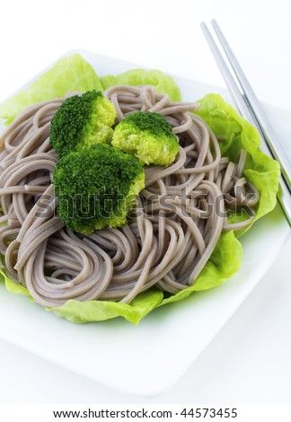 Soba Noodles. Japanese Vegetarian Soba Noodles with Vegetable on White Plates.
