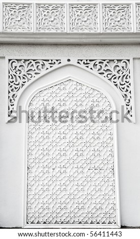 An example of Islamic mosque design cast in concrete on a building in Terengganu, Malaysia.