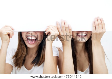 of Asian women holding a