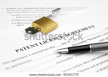 patent licence agreement document with open lock