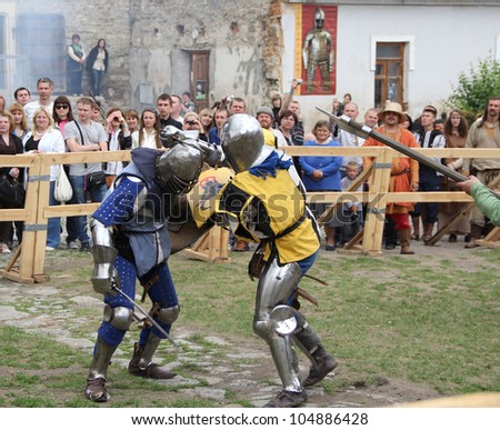 KAMYANETS-PODILSKY, UKRAINE - JUNE 2: Unidentified knights fighting  during Forpost (The Outpost) Festival of Medieval Culture on June 2, 2012 in Kamyanets-Podilsky, Ukraine