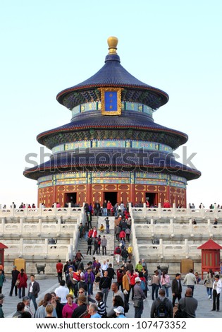 BEIJING, CHINA - OCTOBER 14: People visit the famous Temple of Heaven on October 14, 2011 in Beijing, China. The Temple of Heaven was selected as a UNESCO World Heritage Site in 1998