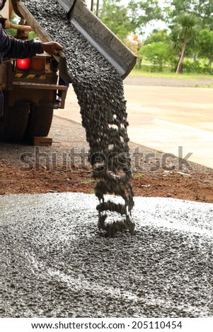 Pouring cement during sidewalk upgrade