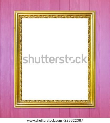 blank golden frame on colorful wood wall background