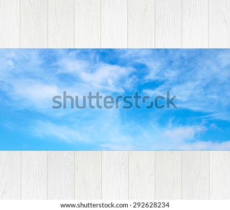 white wood path with the blue sky