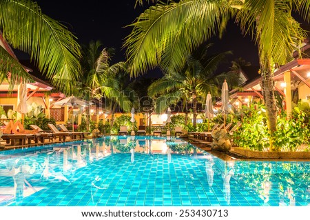 night view of beautiful swimming pool in tropical resort , Phuket, Thailand