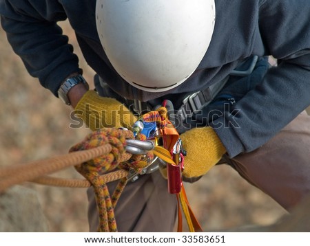 mountaineer with climbing equipment