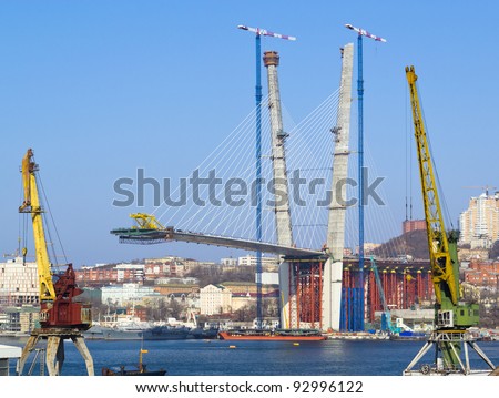 construction of big guyed bridge in the Russian Vladivostok over the Golden Horn bay